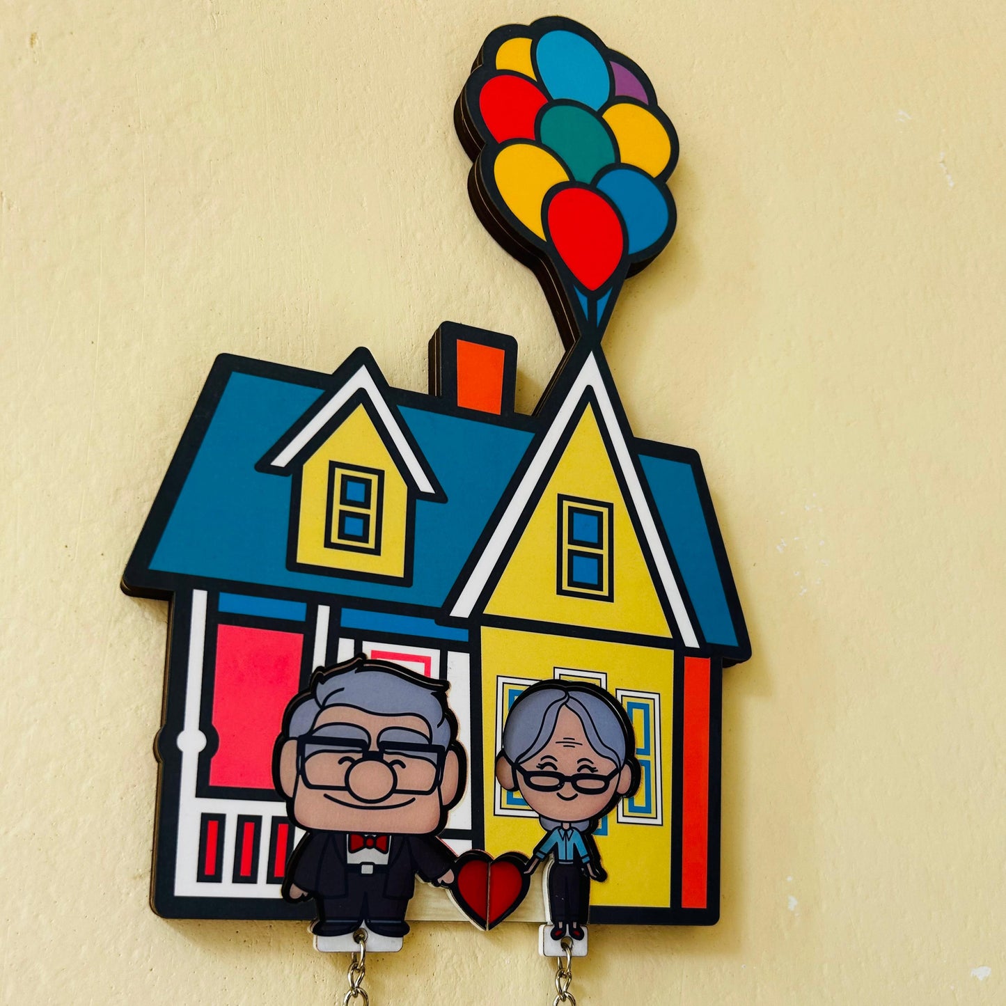 Llaveros Versión Up